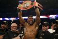 British boxer Anthony Joshua celebrates winning the IBF heavyweight title.