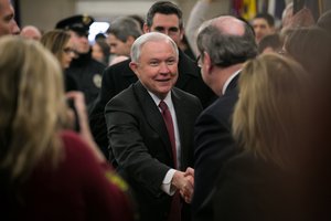 Attorney General Sessions greets employees as he arrives at the Department of Justice