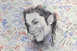 A close-up of a poster signed by well wishers of Michael Jackson at the Charles H. Wright Museum of African American History in Detroit