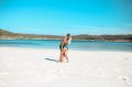 A couple relaxing at Kingfisher Bay Resort.