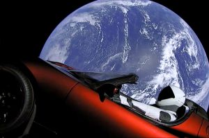 This image from video provided by SpaceX shows the company's spacesuit in Elon Musk's red Tesla sports car which was ...