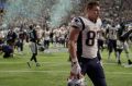 New England Patriots' Rob Gronkowski walks off the field after the NFL Super Bowl 52 football game against the ...