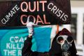 Protestors gather at Federal Parliament this week to oppose the Adani coal mine.