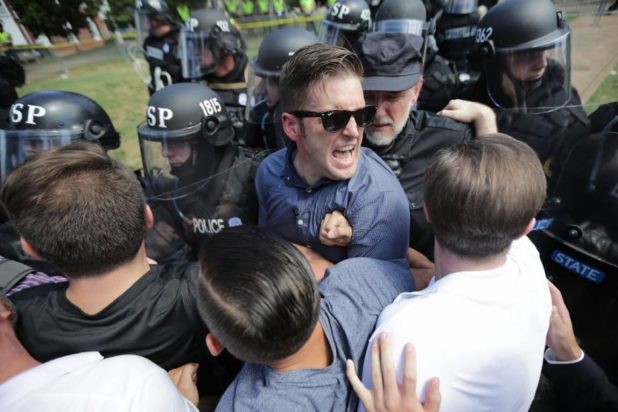 Richard Spencer retreats from Charlottesville's Unite the Right rally on August 12. 