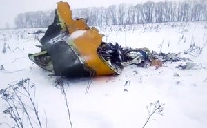 In this screen grab provided by the Life.ru, the wreckage of a AN-148 plane is seen in Stepanovskoye village, about 40 kilometers (25 miles) from the Domodedovo airport, Russia, Sunday, Feb. 11, 2018.