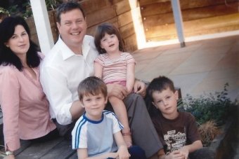 Campaign photo of Tim Nicholls and wife Mary with their three children, Kate, Jeremy, and Duncan.