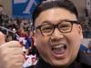 TOPSHOT - A man impersonating North Korean leader Kim Jong Un gestures as he stands before North Korean cheerleaders attending the Unified Korean ice hockey game against Japan during the Pyeongchang 2018 Winter Olympic Games at the Kwandong Hockey Centre in Gangneung on February 14, 2018. / AFP PHOTO / YELIM LEE