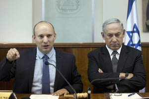 File - Israeli Prime Minister Benjamin Netanyahu, right, and Israeli Minister of Education Naftali Bennett attend the weekly cabinet meeting at the prime minister's office in Jerusalem, Tuesday, Aug. 30, 2016.