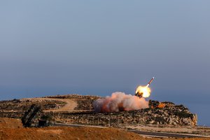 File - German soldiers assigned to Surface Air and Missile Defense Wing 1 fire the Patriot air defense missiles at the NATO Missile Firing Installation during Exercise Artemis Strike 2017 in Chania, Greece, Nov. 8, 2017.