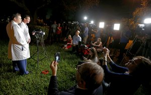 Dr. Igor Nichiporenko, Medical Director Trauma, left, and Dr. Evan Boyer, Medical Director, Emergency Services, speak about treating victims and the suspect at a press conference outside Broward Health North hospital, Wednesday, Feb. 14, 2018, in Deerfield Beach, Fla.