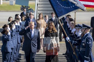 File - President Donald J. Trump and First Lady Melania Trump are greeted to Japan by the Yokota Air Base Honor Guard, Nov. 5, 2017, at Yokota Air Base, Japan.