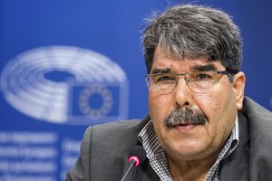 In this Sept. 1, 2016 file photo, then co-chair of the Syrian Kurdish Democratic Union Party (PYD) Salih Muslim addresses journalists at the European Parliament in Brussels. Turkey's official news agency, Anadolu, and a Syrian Kurdish official said Sunday, Feb. 25, 2018, that Czech authorities have detained Muslim under an Interpol red notice based on Ankara's request for his arrest.