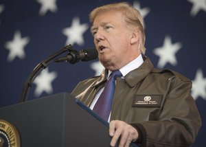 President Donald J. Trump addresses service members during a Troop Talk, Nov. 5, 2017, at Yokota Air Base, Japan.