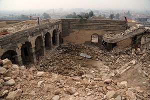 In this Saturday, Jan. 21, 2017 photo, destroyed Mosque of The Prophet Younis, or Jonah, in Mosul, Iraq. The revered Muslim shrine was destroyed on 2014 by Islamic State militants who overran the city and imposed their harsh interpretation of Islamic law. The mosque was built on an archaeological site dating back to 8th century BC, and is said to be the burial place of the prophet, who in stories from both the Bible and Quran is swallowed by a whale. (AP Photo/Khalid Mohammed)