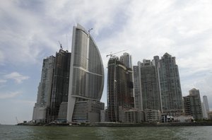 This photo taken July 4, 2011, shows the Trump Ocean Club International Hotel and Tower, third building from left, in Panama City.