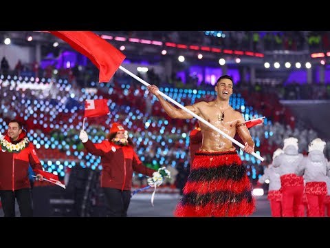 Shirtless, Oiled Flag Bearer Braves Frigid Weather For Olympics Opening Ceremony