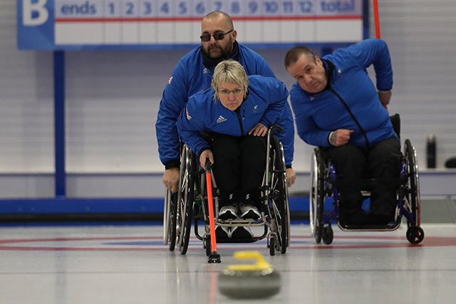 Angela Malone plays an end of Wheelchair Curling