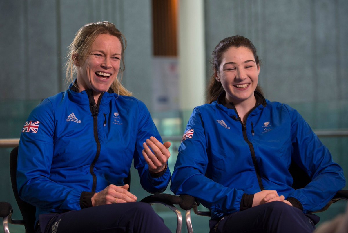 Menna and Jen laughing during an interview