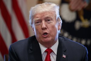 President Donald Trump speaks during a meeting with steel and aluminum executives in the Cabinet Room of the White House, Thursday, March 1, 2018, in Washington.