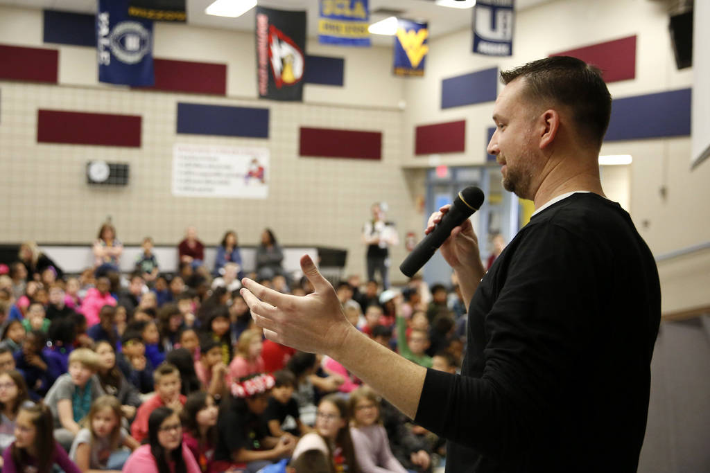 Chad Trisef, author of the Oracle Series, talks about his books in order to promote literacy for Nevada Reading Week at Harriet Treem Elementary School in Henderson on Monday, Feb. 26, 2018. Andre ...