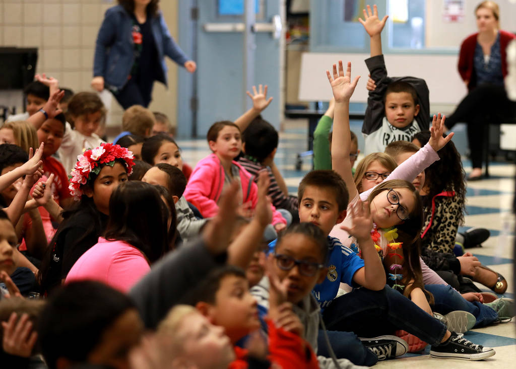 Students attend a school assembly for Chad Trisef, author of the Oracle Series, during Nevada Reading Week at Harriet Treem Elementary School in Henderson on Monday, Feb. 26, 2018. Andrea Cornejo  ...