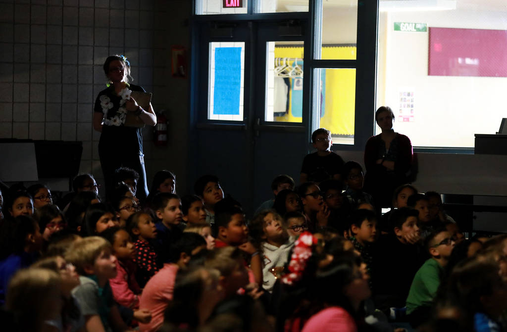 Students attend a school assembly for Chad Trisef, author of the Oracle Series, during Nevada Reading Week at Harriet Treem Elementary School in Henderson on Monday, Feb. 26, 2018. Andrea Cornejo  ...