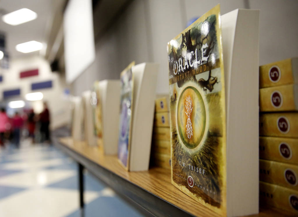 Chad Trisef's Oracle Series are placed on display during Nevada Reading Week at Harriet Treem Elementary School in Henderson on Monday, Feb. 26, 2018. Andrea Cornejo Las Vegas Review-Journal @Drea ...