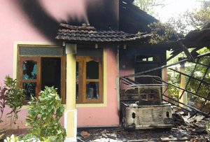 File - A house stands vandalized following racial violence near Galle, Sri Lanka, Saturday, Nov. 18, 2017. Violence in the country's south started over a dispute between majority Buddhists and minority Muslims.