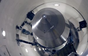 In this photo taken June 25, 2014, an inert Minuteman 3 missile is seen in a training launch tube at Minot Air Force Base, N.D.