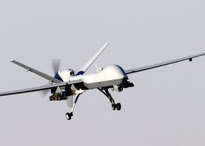 A MQ-9 Reaper unmanned aerial vehicle (drone) prepares to land after a mission in support of Operation Enduring Freedom in Afghanistan. The Reaper has the ability to carry both precision-guided bombs and air-to-ground missiles.