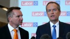 Opposition Leader Bill Shorten, right, and shadow treasurer Chris Bowen say the cash refund is eroding the ...