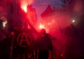 Members of the 20 February Movement carry flares during a demonstration on November 6, 2016 in the capital Rabat, to demand justice for a fish seller whose gruesome death, when he was crushed in a rubbish truck, sparked nationwide outrage.
Mouhcine Fikri, 31, was accidentally killed last on October 29, in the northern city of Al-Hoceima as he tried to protest against the seizure and destruction of swordfish, which are not allowed to be caught at this time of year. / AFP PHOTO / FADEL SENNA