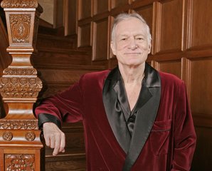 In this April 7, 2006 file photo, Playboy founder Hugh Hefner poses at the Playboy Mansion in the Holmby Hills area of Los Angeles.