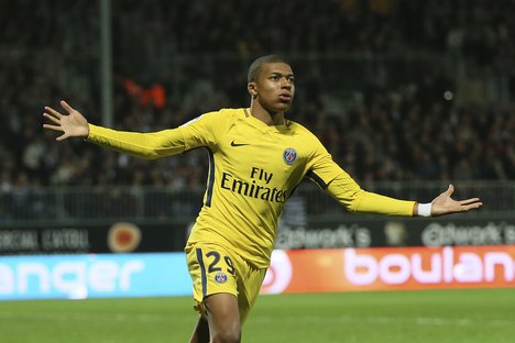 Paris Saint Germain's Kylian Mbappe celebrates after scoring the fifth goal