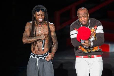 From left, Lil Wayne (aka Dwayne Michael Carter Jr.)and Birdman (aka Bryan Williams) perform