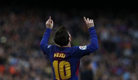 Lionel Messi reacts after scoring against Atletico Madrid at the Camp Nou, March 4, 2018.