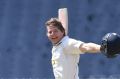 Victoria’s Will Pucovski celebrates his maiden first-class century at the MCG on Sunday. 