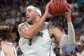 Josh Boone of United wins the ball during the NBL round 11 match between Melbourne United and Adelaide 36ers at Hisense ...