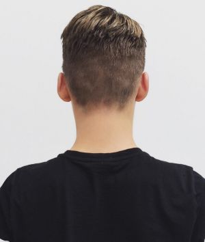 J0X1WW Rear view of a boy with a new haircut Generic Teenage boy with? haircut?