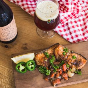 Cedar-planked grilled salmon with Three Knocks