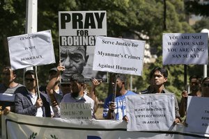 Members of the Rohingya community gather in Hyde park to protest against Myanmar leader Aung San Suu Kyi, who is attending the Association of Southeast Asian Nations, ASEAN, special summit, in Sydney, Saturday, March 17, 2018.