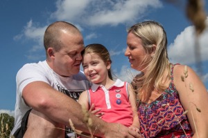 Aimee and Matt Dean with daughter Mackenzie, 5.