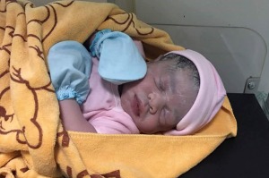Cambodian Lux Clinic posted a photo of a minutes-old baby girl on Facebook following Hour Vanny's cesarean section on ...