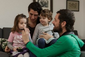 MELBOURNE, AUSTRALIA - JUNE 30: Sarah and Seth Gory play with their daughter Waratah and son Tanami in their unit in ...