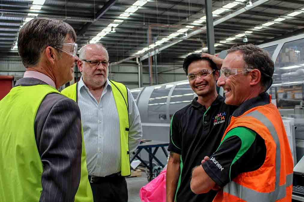 Congratulating management and staff at local manufacturer, Planex