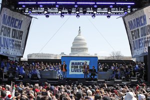 Lin-Manuel Miranda, left, and Ben Platt perform "Found Tonight" during the "March for Our Lives" rally in support of gun control, Saturday, March 24, 2018, in Washington.