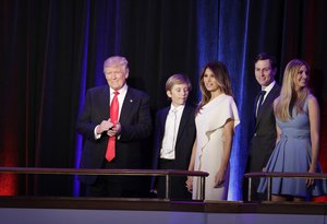 President-elect Donald Trump, left, and family walk to the stage during an election night rally Wednesday, Nov. 9, 2016, in New York.