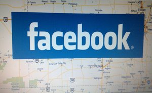 A Facebook logo over google map of Kansas, United States