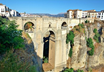 Beautiful Ronda, in the Malaga province of Spain, is set high on the clifftops over the El Tajo gorge.  The 18th century ...