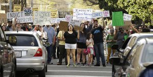 Protestors block an intersection in downtown Sacramento, Calif., after the funeral for police shooting victim Stephon Clark Thursday, March 29, 2018. Clark, who was unarmed, was shot and killed by Sacramento Police officers, Sunday, March 18, 2018.